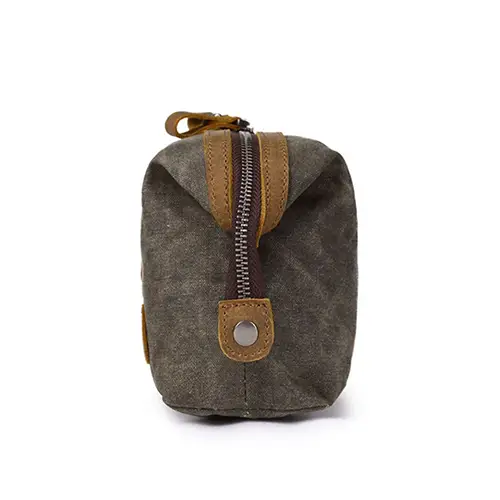 Wholesale premium waxed canvas and full-grain leather travel toiletry bag with vintage aesthetic for lifestyle brands